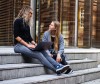 two-women-having-conversation-on-stairs-1438084_trimmed.jpg